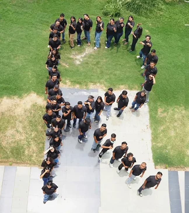 Ritz team forming the letter R Ritz team forming the letter R